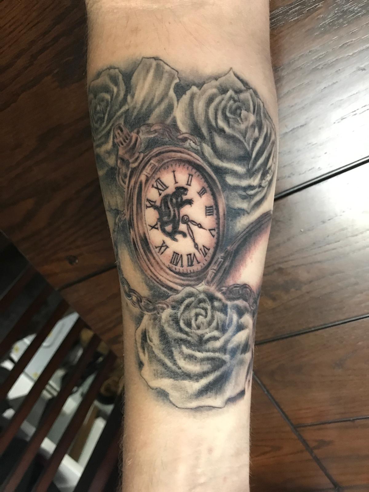 Jake Sadoway's tattoo of a pocket watch and black panther honoring his great-grandfather's military service